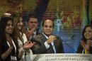 Egyptian President Abdel-Fattah al-Sisi (C) gestures as he gives a speech at the end of the Egypt economic development conference at the congress hall in the Red Sea resort of Sharm el-Sheikh on March 15, 2015