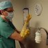 A surgeon washes his hands before enter in an operating room at the Ambroise Pare hospital in Marseille