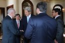 U.S. Secretary of State John Kerry, center, and members of the Friends of Syria group are seen during a meeting in Istanbul, Turkey, Saturday, April 20, 2013. Kerry is expected to announce a significant expansion of non-lethal aid to the Syrian opposition.(AP Photo/Hakan Goktepe, Pool)