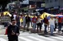 Opposition supporters take part in a rally demanding a referendum to remove Venezuela's President Nicolas Maduro in San Cristobal