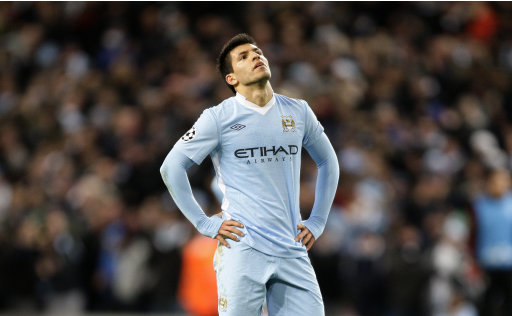 Manchester City's Sergio Aguero waits for play to resume after a break during his team's Champions League Group A soccer match against Bayern Munich at the Etihad Stadium, Manchester, England, Wednesday Dec. 7, 2011. (AP Photo/Jon Super)