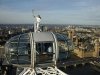 Torch bearer Amelia Hempleman-Adams, age 17, stands on top of a capsule on the London Eye as part of the torch relay ahead of the London 2012 Olympic Games in London