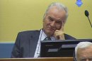 In this video image taken from ICTY video former Bosnian Serb military commander Gen. Ratko Mladic is seen on the second day of his trial at the Yugoslav war crimes tribunal in The Hague, Netherlands Thursday May 17, 2012. Prosecutors on Thursday were to outline their evidence of the alleged involvement of former Bosnian Serb military chief Gen. Ratko Mladic in Europe's worst mass murder since World War II, the 1995 Srebrenica massacre but the presiding judge in the trial suspended the case indefinitely due to disclosure errors by prosecutors. (AP Photo/ICTY video, Pool) EDITORIAL USE ONLY
