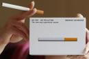 A woman displays a package of E-cigarette in Bordeaux
