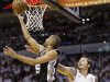 San Antonio Spurs' Tony Parker (9) shoots against the Miami Heat's Mike Miller (13) during the first half in Game 7 of the NBA basketball championships, Thursday, June 20, 2013, in Miami. (AP Photo/Lynne Sladky)