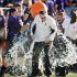 Northwestern coach Pat Fitzgerald is doused in the closing minute of the Wildcats 34-20 victory over Mississippi State in the Gator Bowl NCAA college football game, Tuesday, Jan. 1, 2013, in Jacksonville, Fla.   (AP Photo/The Florida Times-Union, Bob Self)