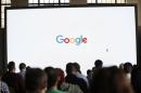 Attendees wait for the program to begin during the presentation of new Google hardware in San Francisco
