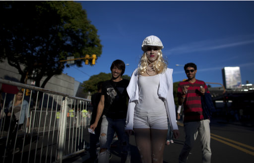 Lady Gaga fans gather outside the stadium where the U.S. pop star will perform a concert, in Buenos Aires, Argentina, Friday, Nov. 16, 2012. The Latin American leg of her, "Born This Way Ball Tour," is coming to an end but not before stopping in Chile, Peru and Paraguay,. (AP Photo/Natacha Pisarenko)