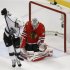 Kings' Richards scores on Blackhawks goalie Crawford during the closing seconds of the third period in Game 5 of their NHL Western Conference final hockey playoff series in Chicago
