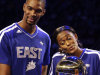 Chris Bosh of the Miami Heat and Swin Cash of the Chicago Sky hold the trophy after they and Dominique Wilkins won the Shooting Stars contest during NBA basketball All-Star Saturday Night, Feb. 16, 2013, in Houston. (AP Photo/Eric Gay)