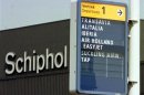 SIGN SHOWS DIRECTION TO DEPARTURE OF ALITALIA AND IBERIA FLIGHTS AT AMSTERDAM'S SCHIPHOL AIRPORT.