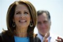 File image of Bachmann speaking next to Romney during a rally at Crofton Industries in Portsmouth
