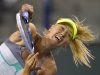 Maria Sharapova, of Russia, serves to Sara Errani, of Italy, during their match at the BNP Paribas Open tennis tournament, Wednesday, March 13, 2013, in Indian Wells, Calif. (AP Photo/Mark J. Terrill)
