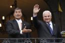 Ecuadorean President Rafael Correa (L) and his Panamanian counterpart Ricardo Martinelli wave from a balcony of the Carondelet presidential palace in Quito on May 13, 2011
