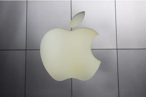 The Apple logo is pictured at its flagship retail store in San Francisco, California January 27, 2014. REUTERS/Robert Galbraith/Files