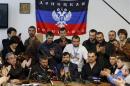 Pro-Russian separatist leader Pushilin talks during a media conference inside a regional government building in Donetsk, eastern Ukraine