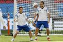 Argentina's Lionel Messi, left, and Argentina's Gonzalo Higuain take part in a training session at Estadio Nacional in Brasilia, Brazil, Friday, July 4, 2014. On Saturday, Argentina will face Belgium in their World Cup quarterfinals soccer match. (AP Photo/Eraldo Peres)