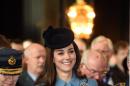 Britain's Kate, the Duchess of Cambridge smiles as she attends a service at RAF church St Clement Danes, to mark the 75th anniversary year of the RAF Air Cadets, in London, Sunday, Feb. 7, 2016. (Eddie Mulholland/Pool Photo via AP)