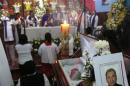 This Sept. 21, 2016 photo shows the funeral Mass for slain Rev. Jose Alfredo Suarez de la Cruz at Our Lady of Asuncion Church in Paso Blanco, Veracruz state, Mexico, his hometown. Church leaders are increasingly frustrated by authorities' inability to protect their priests under Mexican President Enrique Pena Nieto's administration. (AP Photo/Marco Ugarte)