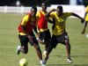 Ghana's Gyan is challenged by Akaminko during a training session ahead of their African Nations Cup soccer match against Mali, at the Nelson Mandela Bay Stadium in Port Elizabeth