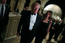 U.S. President-elect Donald Trump and his wife Melania Trump arrive for a New Year's Eve celebration with members and guests at the Mar-a-lago Club in Palm Beach