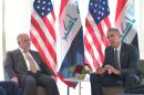 US President Barack Obama (R) speaks during a bilateral meeting with Iraq's Prime Minister Haider Al-Abadi on the sidelines of the G7 Summit in southern Germany on June 8, 2015
