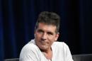 Simon Cowell attends a panel for the television series "The X Factor" during the Fox portion of the Television Critics Association Summer press tour in Beverly Hills