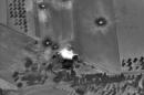 A video grab made on October 1, 2015, shows footage made available on the Russian Defence Ministry's official website, purporting to show an airstrike in Syria