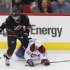 Carolina Hurricanes' Semin battles Montreal Canadiens' Moen for the puck during the third period of their NHL hockey game in Raleigh