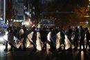 Riot police blocks a main road during clashes in Ankara