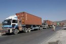 Truck carrying supplies for NATO troops crossed into Afghanistan from Pakistan at the Tor kham
