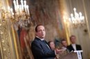 France's President Hollande attends an awards ceremony at the Elysee Palace in Paris