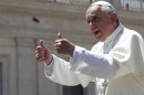 Pope Francis gives the thumbs up during the weekly audience in Saint Peter's Square at the Vatican