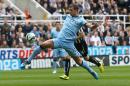 Manchester City's Bosnian striker Edin Dzeko controls the ball on August 17, 2014