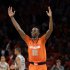 Syracuse's Baye Keita (12) celebrates after the overtime period of an NCAA college basketball game against the Georgetown at the Big East Conference tournament Friday, March 15, 2013, in New York. Syracuse won the game 58-55. (AP Photo/Frank Franklin II)