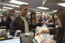 U.S. President Barack Obama shops with daughter Malia at Politics and Prose Bookstore and Coffeehouse in Washington