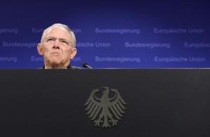 German Finance Minister Wolfgang Schaeuble gives a …