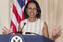Former US Secretary of State Condoleezza Rice speaks during ceremonies to unveil the official painting of her that will hang in the State Department diplomatic room in Washington, DC on June 18, 2014