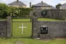 The entrance to the site of a mass grave of hundreds of children who died in the former Bons Secours home for unmarried mothers is seen in Tuam, County Galway