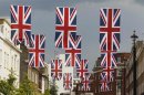 Union Jack flags hang over Elizabeth Street in London