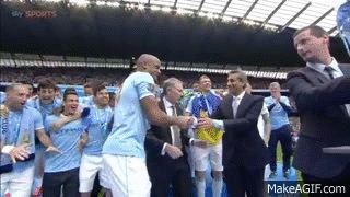Manchester City lift the Premier League trophy after being crowned champions