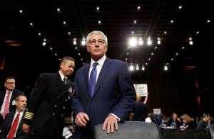 Hagel takes his seat to testify at the Senate Armed &hellip;