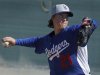 Dodgers' pitcher Zack Greinke throws during MLB Cactus League spring training in Glendale