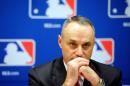 Rob Manfred speaks at a news conference at MLB headquarters on November 22, 2011 in New York City