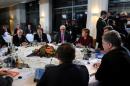 Russian President Putin, German Foreign Minister Steinmeier, German Chancellor Merkel and Ukrainian President Poroshenko attend talks on a stalled peace plan for eastern Ukraine in Berlin