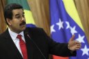 Venezuela's President Maduro delivers a statement to the media with Brazil's President Rousseff at the Planalto Palace in Brasilia