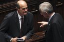 Mario Monti e Pier Luigi Bersani alla Camera in una immagine di archivio
