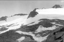 In this Aug. 7, 1903 photo from the U.S. Geological Survey is Lyell Glacier in Yosemite National Park. In parts of California's Sierra Nevada, the incursion of trees is sucking marshy meadows dry. Glaciers are melting into mere ice fields. Wildflowers are blooming earlier. And the optimal temperature zone for Giant Sequoias is predicted to rise several thousand feet higher, leaving existing trees at risk of dying over the next 100 years. As the climate warms, scientists studying one of the largest swaths of wilderness in the Continental U.S. are noting changes across national parks, national forests and 3.7 million acres of federally protected wilderness areas that are a living laboratory. (AP Photo/U.S. Geological Survey, G.K. Gilbert)