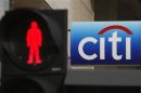 A traffic light is pictured in front of a Citibank branch in Singapore