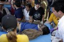 A dead Paraguayan peasant is seen at a health center in Curuguaty